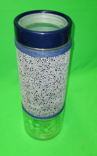 <span style='position: fixed;top: 500px;left: calc( 550px + (100vw - 600px)/2);'></span>
<table width='100%' border='0'>
  <tr>
    <td style='padding: 5px;width: 70%;background-color:#ec0d0d;vertical-align: middle;font-size:35px;height: 102px;border-radius: 20px;'>Canister with Fabric /Jar</td>
    <td class='watch' align='center' style='position: fixed; background-image:url(assets/price.png);background-size: cover;
    font-size: 45px;
    top: 645px;
    left: calc( 460px + (100vw - 600px)/2);
    width: 245px;
    height: 200px;
    text-align: -webkit-center;
    vertical-align: middle;'><div style='padding-top: 90px;transform: rotate(7deg);'><span>70.00  R</span></div></td>    
  </tr>
</table>
