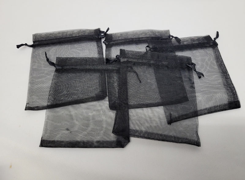 <span style='position: fixed;top: 500px;left: calc( 550px + (100vw - 600px)/2);'></span>
<table width='100%' border='0'>
  <tr>
    <td style='padding: 5px;width: 70%;background-color:#ec0d0d;vertical-align: middle;font-size:35px;height: 102px;border-radius: 20px;'>Organza Bags</td>
    <td class='watch' align='center' style='position: fixed; background-image:url(assets/price.png);background-size: cover;
    font-size: 45px;
    top: 645px;
    left: calc( 460px + (100vw - 600px)/2);
    width: 245px;
    height: 200px;
    text-align: -webkit-center;
    vertical-align: middle;'><div style='padding-top: 90px;transform: rotate(7deg);'><span>1.00  R</span></div></td>    
  </tr>
</table>