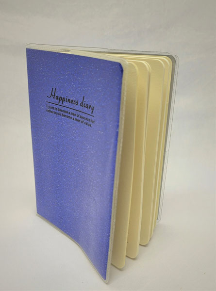 <span style='position: fixed;top: 500px;left: calc( 550px + (100vw - 600px)/2);'></span>
<table width='100%' border='0'>
  <tr>
    <td style='padding: 5px;width: 70%;background-color:#ec0d0d;vertical-align: middle;font-size:35px;height: 102px;border-radius: 20px;'>Happiness Diary 52451</td>
    <td class='watch' align='center' style='position: fixed; background-image:url(assets/price.png);background-size: cover;
    font-size: 45px;
    top: 645px;
    left: calc( 460px + (100vw - 600px)/2);
    width: 245px;
    height: 200px;
    text-align: -webkit-center;
    vertical-align: middle;'><div style='padding-top: 90px;transform: rotate(7deg);'><span>13.00  R</span></div></td>    
  </tr>
</table>