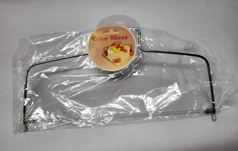 <span style='position: fixed;top: 500px;left: calc( 550px + (100vw - 600px)/2);'></span>
<table width='100%' border='0'>
  <tr>
    <td style='padding: 5px;width: 70%;background-color:#ec0d0d;vertical-align: middle;font-size:35px;height: 102px;border-radius: 20px;'>Cake Slicer</td>
    <td class='watch' align='center' style='position: fixed; background-image:url(assets/price.png);background-size: cover;
    font-size: 45px;
    top: 645px;
    left: calc( 460px + (100vw - 600px)/2);
    width: 245px;
    height: 200px;
    text-align: -webkit-center;
    vertical-align: middle;'><div style='padding-top: 90px;transform: rotate(7deg);'><span>25.00  R</span></div></td>    
  </tr>
</table>