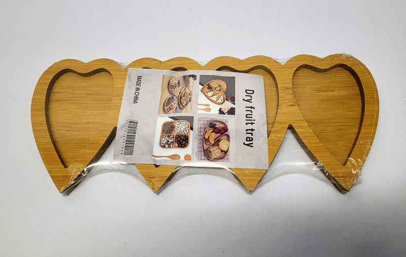 <span style='position: fixed;top: 500px;left: calc( 550px + (100vw - 600px)/2);'></span>
<table width='100%' border='0'>
  <tr>
    <td style='padding: 5px;width: 70%;background-color:#ec0d0d;vertical-align: middle;font-size:35px;height: 102px;border-radius: 20px;'>Heart Dry Fruit Tray 4 sides</td>
    <td class='watch' align='center' style='position: fixed; background-image:url(assets/price.png);background-size: cover;
    font-size: 45px;
    top: 645px;
    left: calc( 460px + (100vw - 600px)/2);
    width: 245px;
    height: 200px;
    text-align: -webkit-center;
    vertical-align: middle;'><div style='padding-top: 90px;transform: rotate(7deg);'><span>50.00  R</span></div></td>    
  </tr>
</table>