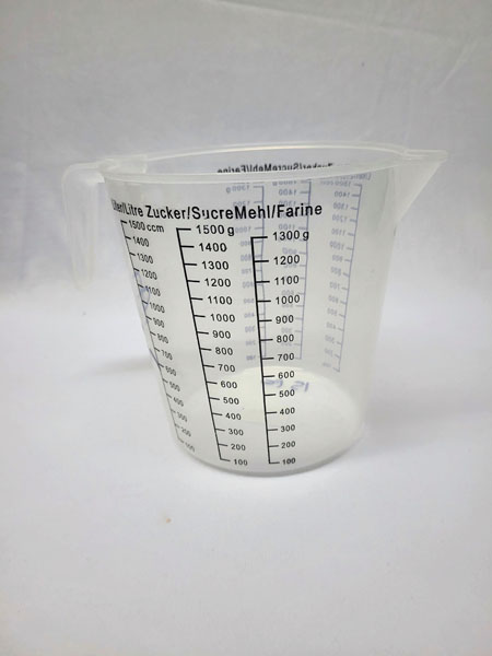 <span style='position: fixed;top: 500px;left: calc( 550px + (100vw - 600px)/2);'></span>
<table width='100%' border='0'>
  <tr>
    <td style='padding: 5px;width: 70%;background-color:#ec0d0d;vertical-align: middle;font-size:35px;height: 102px;border-radius: 20px;'>Clear Measuring Jug 1.5 liters Item No:C38-1500</td>
    <td class='watch' align='center' style='position: fixed; background-image:url(assets/price.png);background-size: cover;
    font-size: 45px;
    top: 645px;
    left: calc( 460px + (100vw - 600px)/2);
    width: 245px;
    height: 200px;
    text-align: -webkit-center;
    vertical-align: middle;'><div style='padding-top: 90px;transform: rotate(7deg);'><span>17.00  R</span></div></td>    
  </tr>
</table>