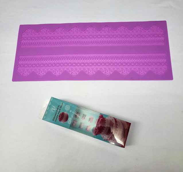 <span style='position: fixed;top: 500px;left: calc( 550px + (100vw - 600px)/2);'></span>
<table width='100%' border='0'>
  <tr>
    <td style='padding: 5px;width: 70%;background-color:#ec0d0d;vertical-align: middle;font-size:35px;height: 102px;border-radius: 20px;'>Silicone Mat to Create Sugar Laces Stock No:CT409</td>
    <td class='watch' align='center' style='position: fixed; background-image:url(assets/price.png);background-size: cover;
    font-size: 45px;
    top: 645px;
    left: calc( 460px + (100vw - 600px)/2);
    width: 245px;
    height: 200px;
    text-align: -webkit-center;
    vertical-align: middle;'><div style='padding-top: 90px;transform: rotate(7deg);'><span>75.00  R</span></div></td>    
  </tr>
</table>