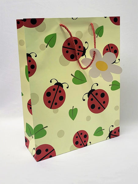<span style='position: fixed;top: 500px;left: calc( 550px + (100vw - 600px)/2);'></span>
<table width='100%' border='0'>
  <tr>
    <td style='padding: 5px;width: 70%;background-color:#ec0d0d;vertical-align: middle;font-size:35px;height: 102px;border-radius: 20px;'>Large Lady Bird Gift Bag  Item No:180316</td>
    <td class='watch' align='center' style='position: fixed; background-image:url(assets/price.png);background-size: cover;
    font-size: 45px;
    top: 645px;
    left: calc( 460px + (100vw - 600px)/2);
    width: 245px;
    height: 200px;
    text-align: -webkit-center;
    vertical-align: middle;'><div style='padding-top: 90px;transform: rotate(7deg);'><span>16.00  R</span></div></td>    
  </tr>
</table>